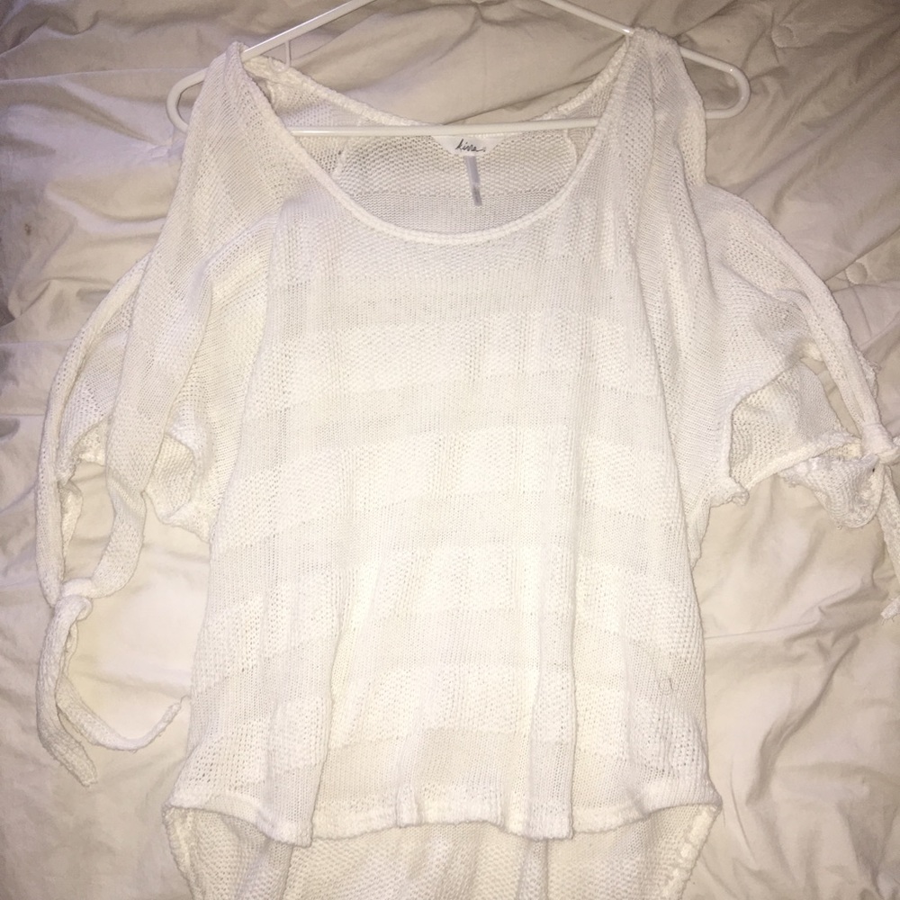 A white flowy beach top off the shoulder top
